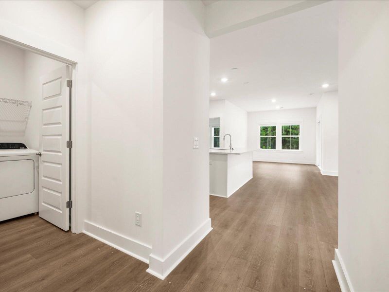 Spacious, unfurnished interior of a new home in The Coves at Lakes of Cane Bay, Summerville (Image 16).