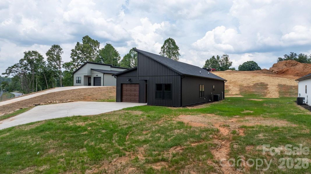 Front exterior of a new home in , Lenoir, NC, highlighting curb appeal (Image 20). Front exterior of a new home in , Lenoir, NC, highlighting curb appeal (Image 20).