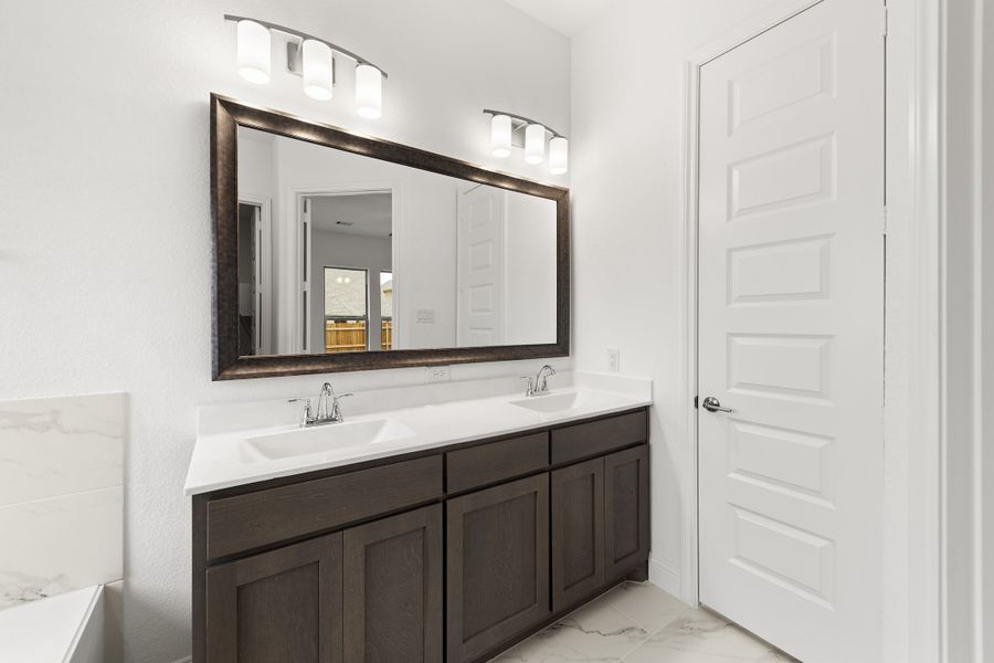 Representative furnished interior of a home built from the Brookstone I by Sandlin Homes in Timberbrook, Justin (Image 13).