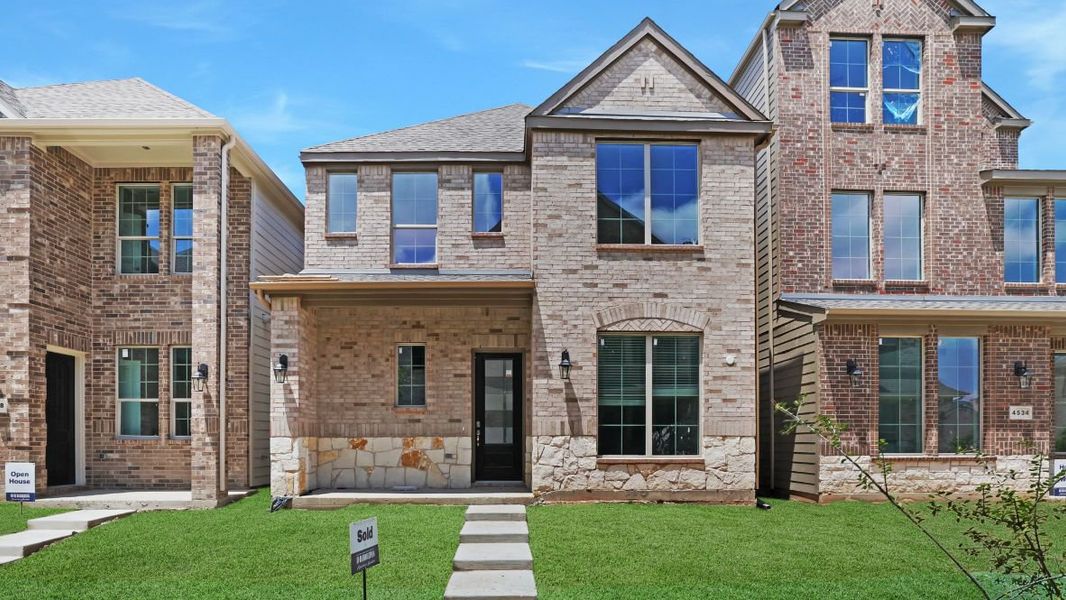 Representative exterior photo of a completed home built from the Lariat by D.R. Horton in Mustang Square, Plano, TX (Image 2). Representative exterior photo of a completed home built from the Lariat by D.R. Horton in Mustang Square, Plano, TX (Image 2).