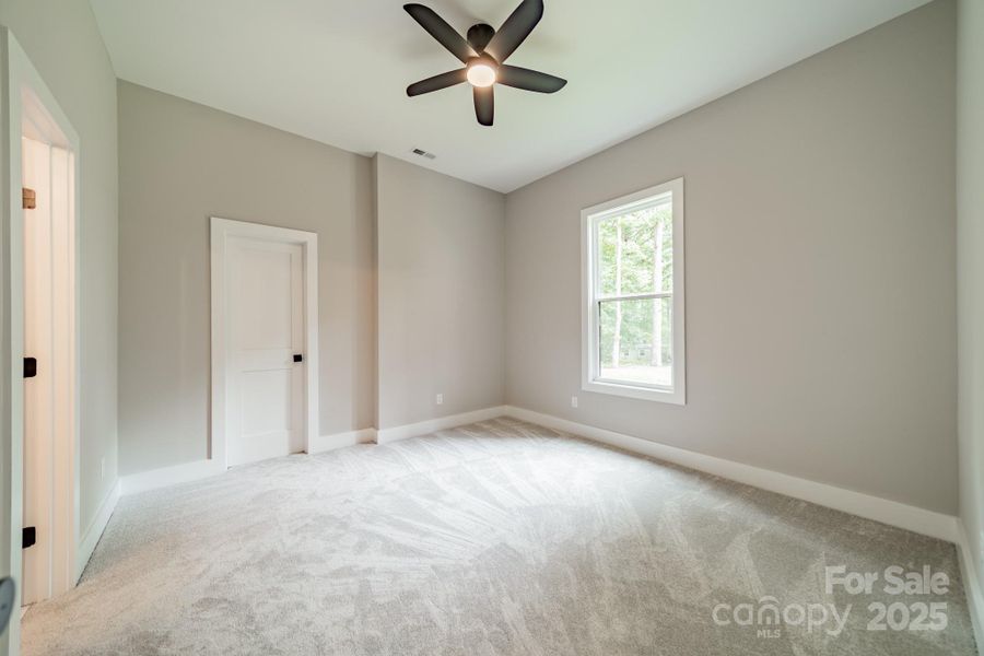 Lower Level Bedroom 4 boast a walk-in closet and faces Lake Norman