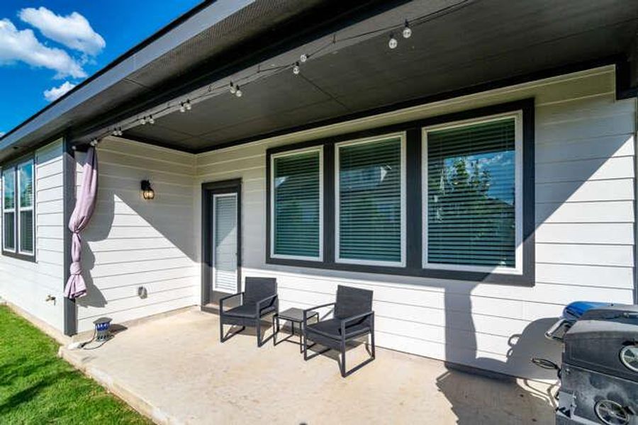 View of patio featuring area for grilling