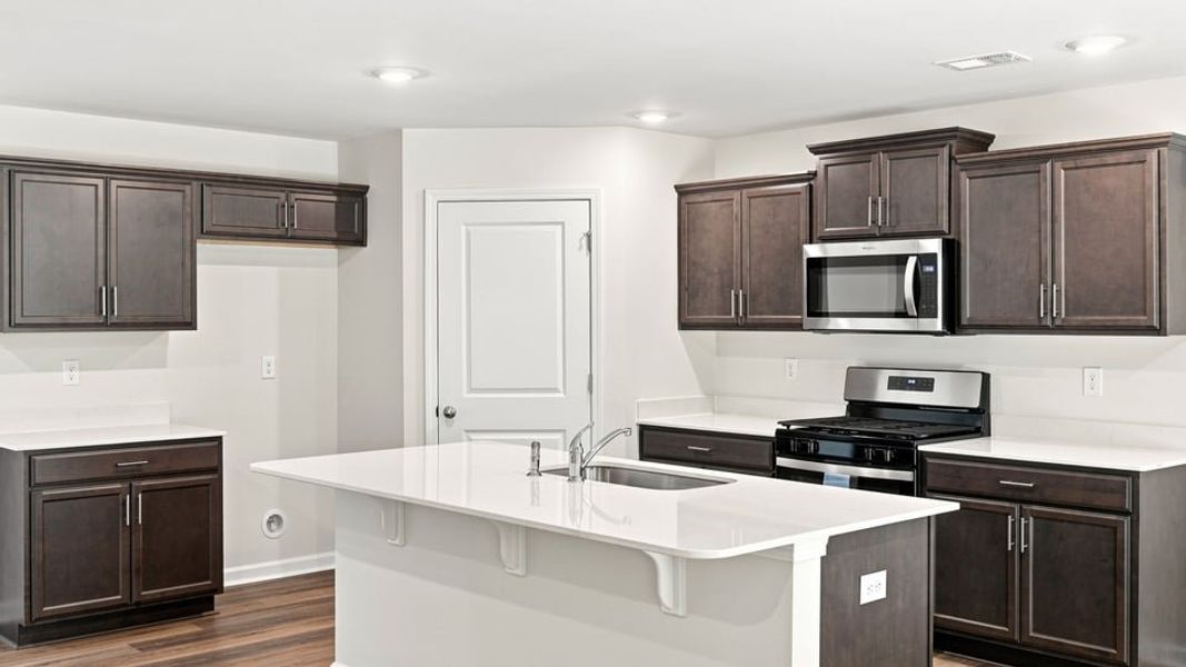 Furnished interior view inside a new home in Bentley Park, Greenwood (Image 8).