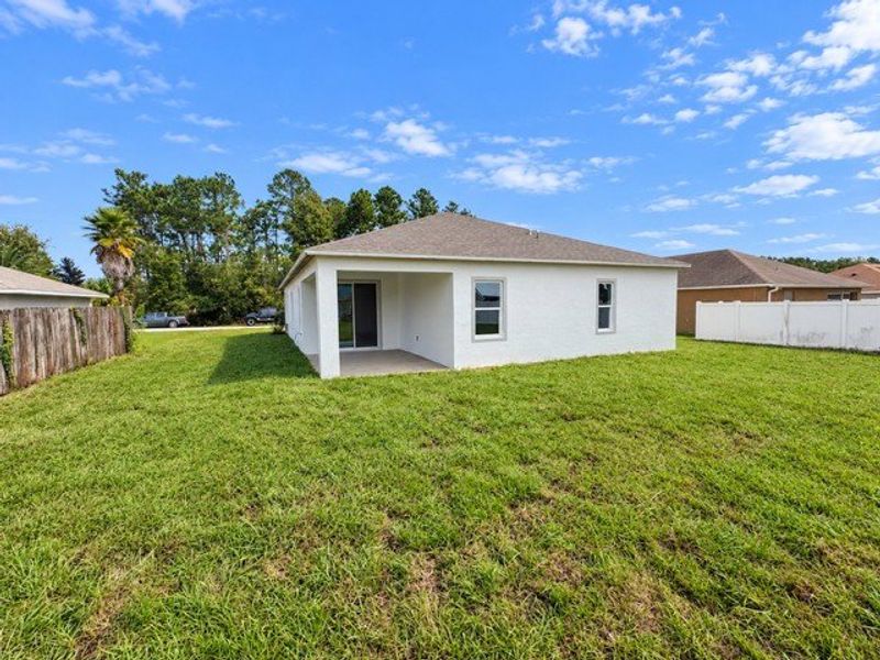 Exterior details and patio area of a home in Palm Coast, Palm Coast (Image 3).