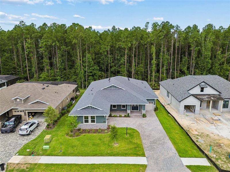 Front exterior of a new home in Southern Hills Plantation, Brooksville, FL, highlighting curb appeal (Image 2). Front exterior of a new home in Southern Hills Plantation, Brooksville, FL, highlighting curb appeal (Image 2).