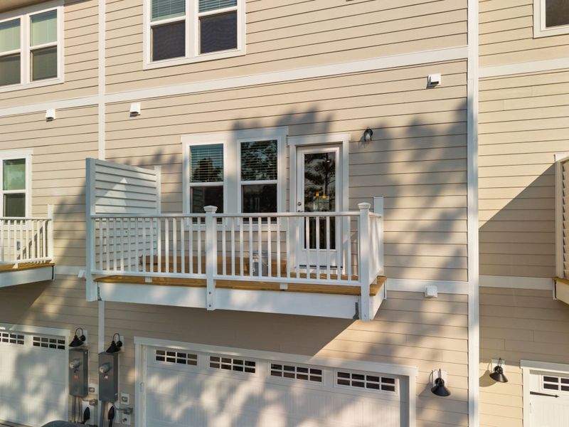 Exterior details and patio area of a home in Lakeside Townes at Riverlights, Wilmington (Image 4). Exterior details and patio area of a home in Lakeside Townes at Riverlights, Wilmington (Image 4).