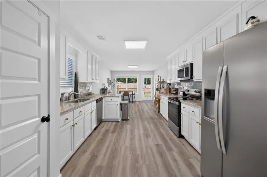 Furnished interior view inside a new home in , Winder (Image 9).