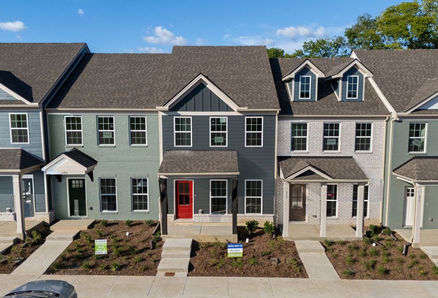 Front exterior of a new home in Oxford Station, Gallatin, TN, highlighting curb appeal (Image 1). Front exterior of a new home in Oxford Station, Gallatin, TN, highlighting curb appeal (Image 1).