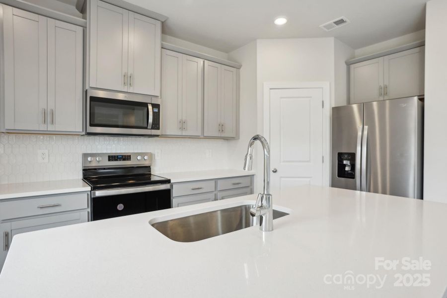 Photo is not of the actual home, but is an inspirational photo of builder’s model home and may depict options, furnishings, and/or decorator features that are not included