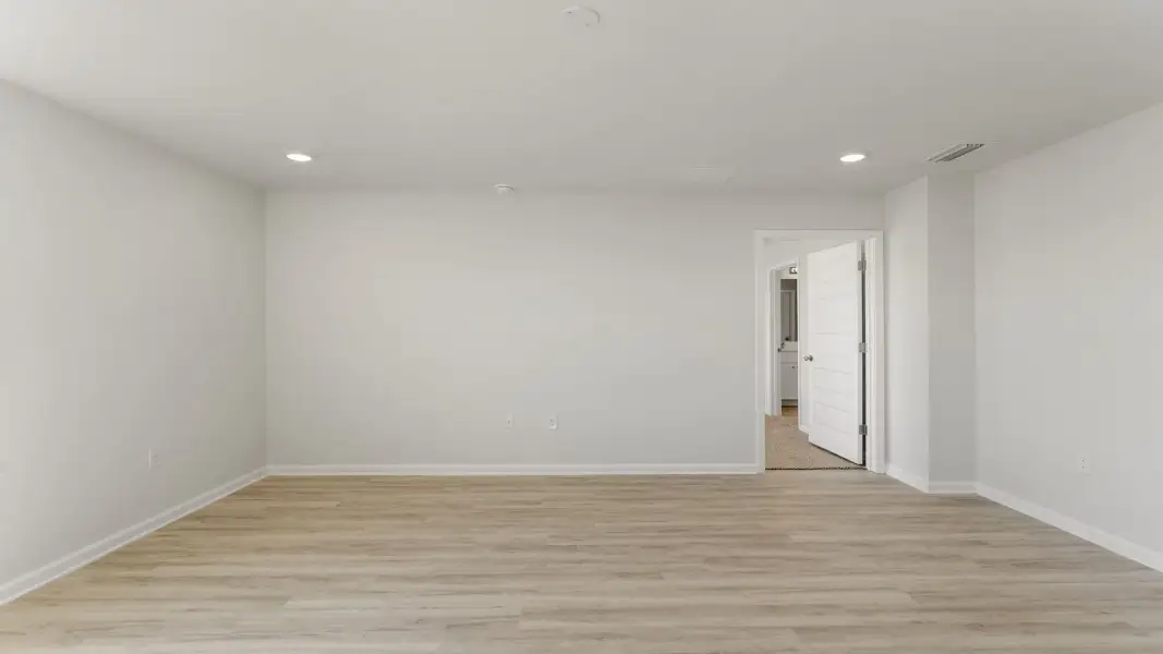 Spacious, unfurnished interior of a new home in Magnolia at the Bluffs Phase 3, Freeport (Image 16). Spacious, unfurnished interior of a new home in Magnolia at the Bluffs Phase 3, Freeport (Image 16).