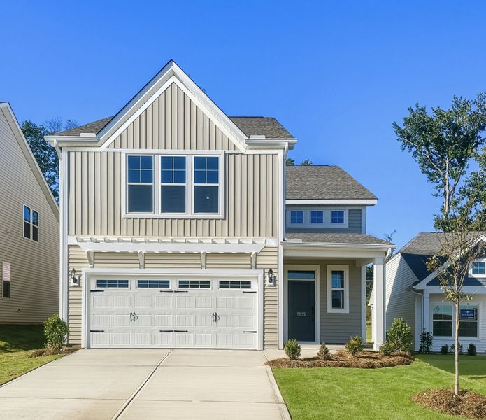Front exterior of a new home in Landmark Commons, Boiling Springs, SC, highlighting curb appeal (Image 1). Front exterior of a new home in Landmark Commons, Boiling Springs, SC, highlighting curb appeal (Image 1).