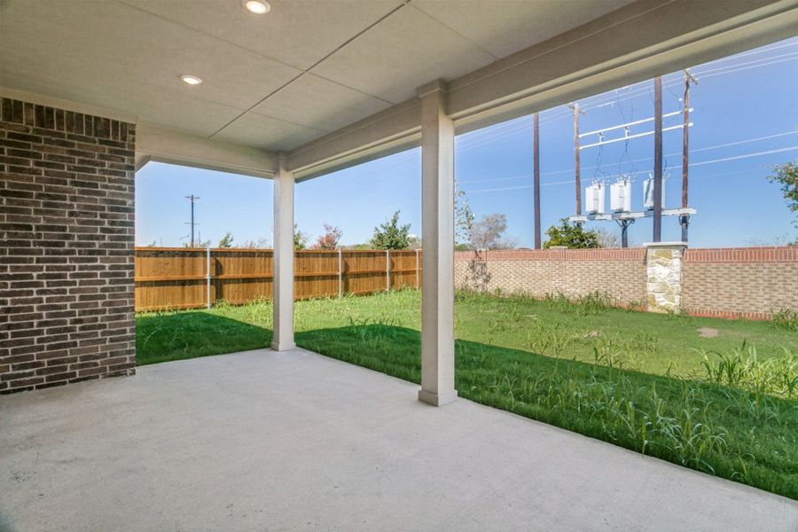 Exterior details and patio area of a home in The Preserve Estates, Justin (Image 4).