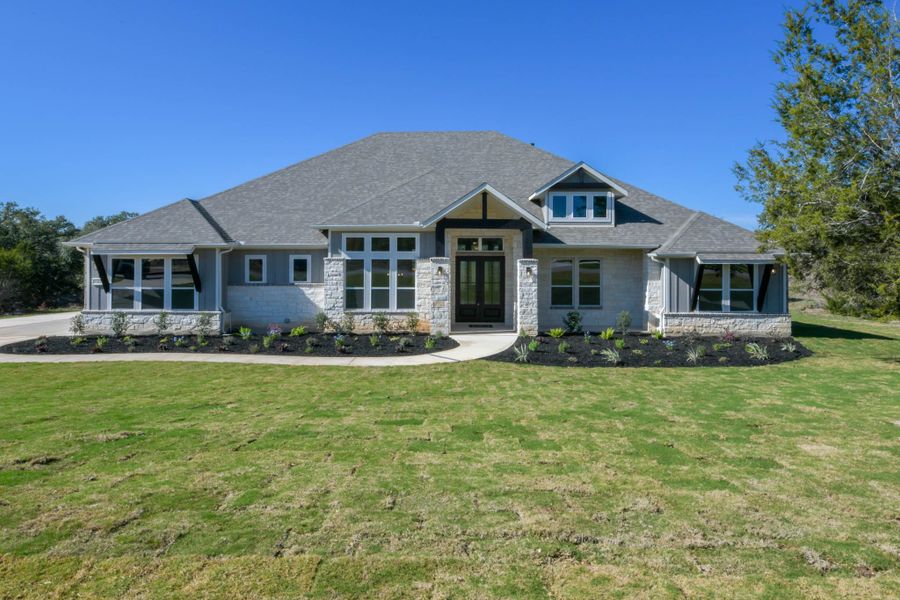 Representative exterior photo of a completed home built from the Cobe by Ashton Woods in Waldsanger, New Braunfels, TX (Image 2). Representative exterior photo of a completed home built from the Cobe by Ashton Woods in Waldsanger, New Braunfels, TX (Image 2).
