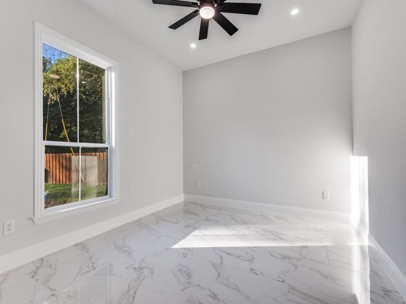 4th room featuring light marble finish floors, recessed lighting, and a ceiling fan.