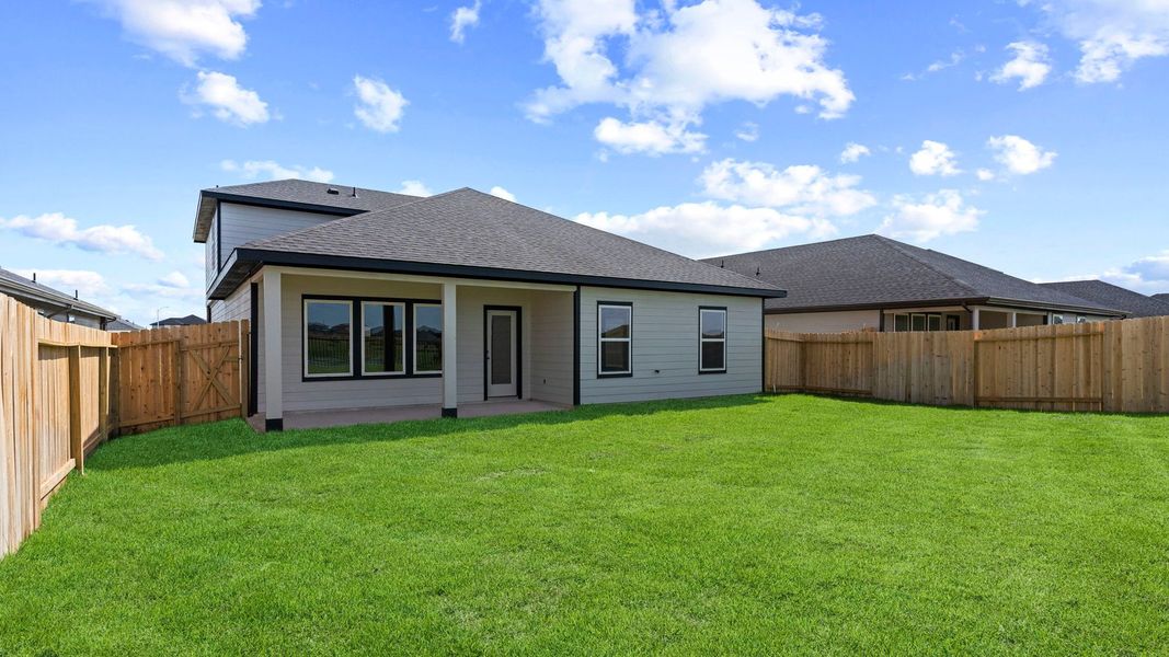 Exterior details and patio area of a home in Tamarron, Fulshear (Image 2).
