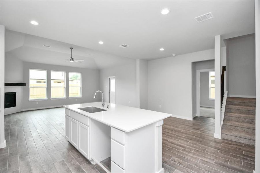 Discover another perspective of this stunning kitchen. Sample photo, actual color and selections can vary.