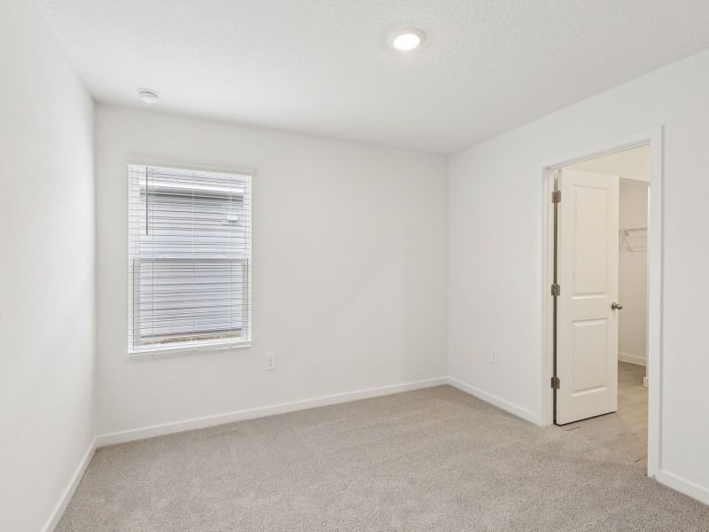 Spacious, unfurnished interior of a new home in Colbert Landings - Signature Series, Palm Coast (Image 6).