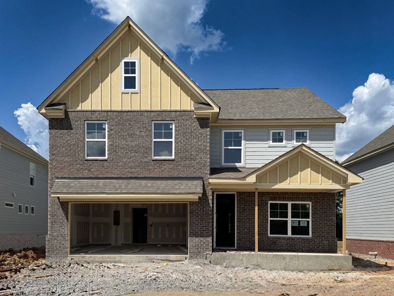 *Photo of actual home under construction Aug 2026. Exterior will be painted.