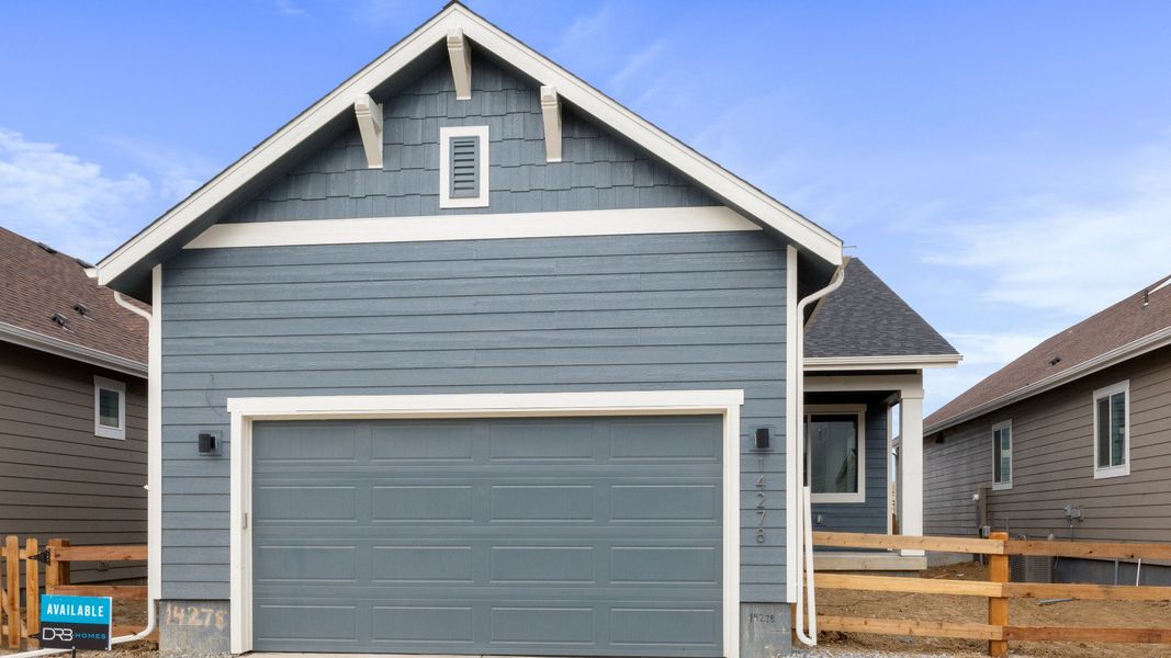 Front exterior of a new home in Dillon Pointe - City, Broomfield, CO, highlighting curb appeal (Image 1).