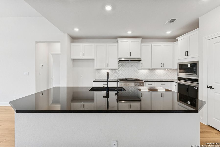 Furnished interior view inside a new home in Davis Ranch 50', San Antonio (Image 8).
