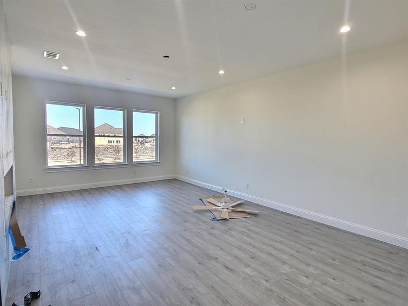 2nd upstairs master bedroom with light hardwood / wood-style flooring