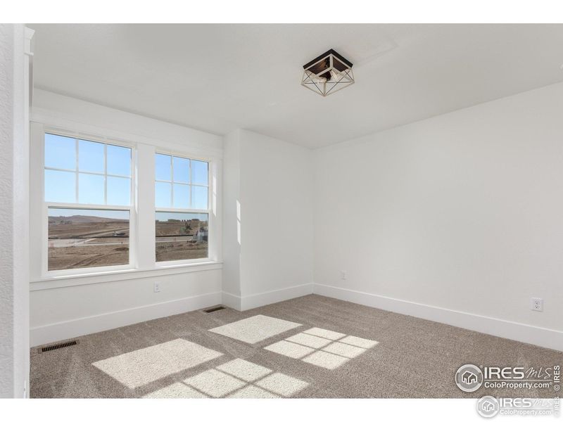 Spacious, unfurnished interior of a new home in Westerly, Erie (Image 18).