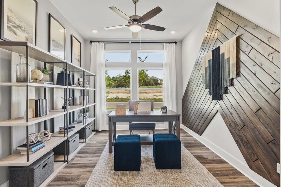 Representative furnished interior of a home built from the Mia by Chesmar Homes in Sweetwater, Austin (Image 11).