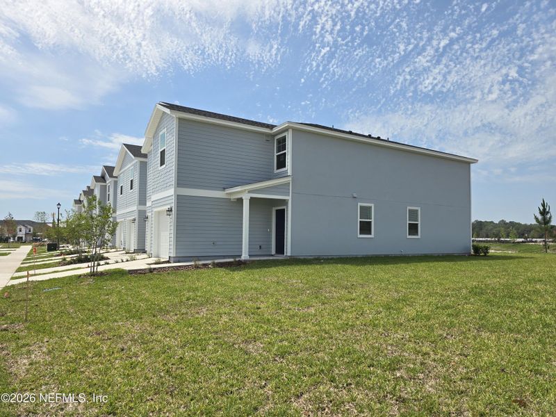 Exterior details and patio area of a home in The District at Oakleaf - The Commons, Middleburg (Image 21).
