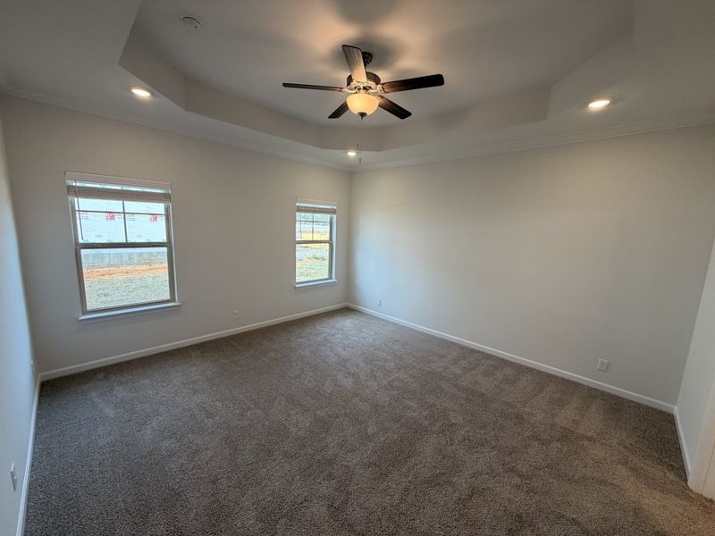 Primary Suite features the popular Trey Ceiling with additional LED lights!
