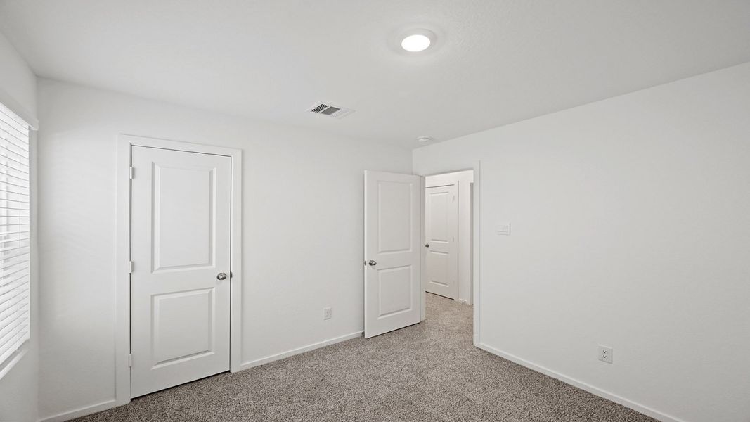 Spacious, unfurnished interior of a new home in Bridges on Lake Houston Villas, Humble (Image 10).
