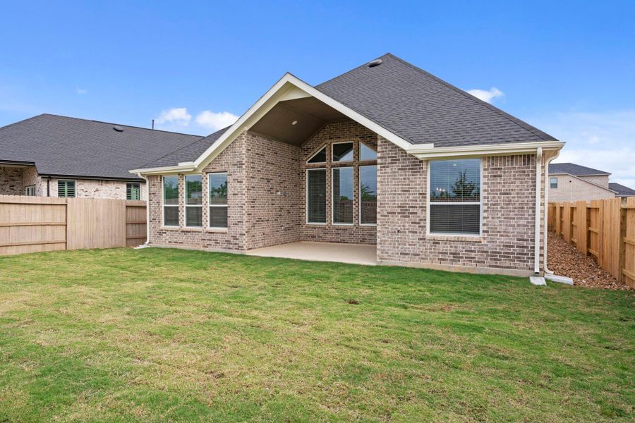 Exterior details and patio area of a home in Grange, Katy (Image 4).