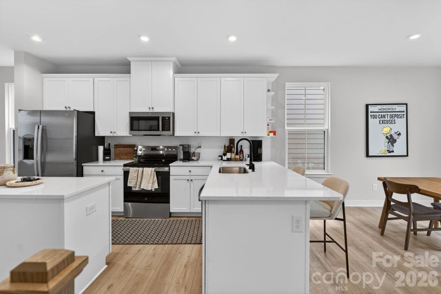 Sleek kitchen offers contemporary finishes