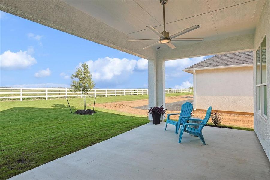 View of patio with ceiling fan