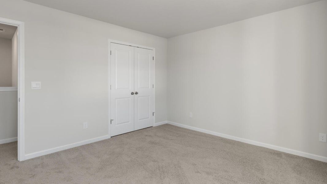 Representative unfurnished interior of a home built from the HARBOR OAK by D.R. Horton in Indigo Preserve, Leland (Image 44).