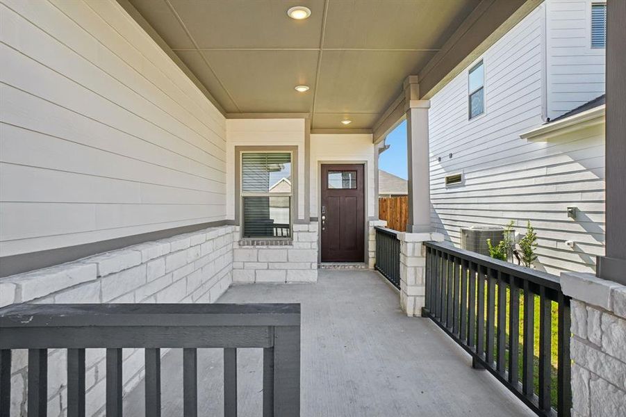 Exterior details and patio area of a home in Trails of Lavon - Spring Series, Lavon (Image 4).