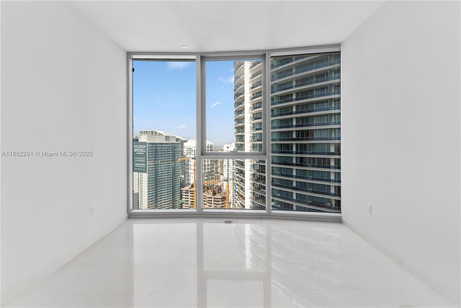 Spacious, unfurnished interior of a new home in Aston Martin Residences, Miami (Image 37).