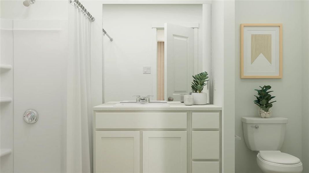 Bathroom with vanity and toilet