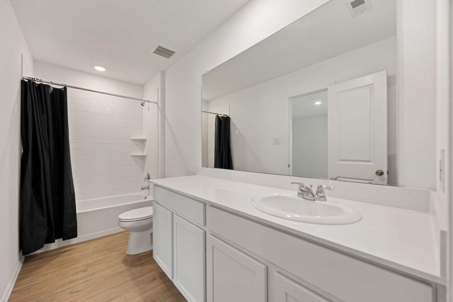 Furnished interior view inside a new home in Tavola, New Caney (Image 10).