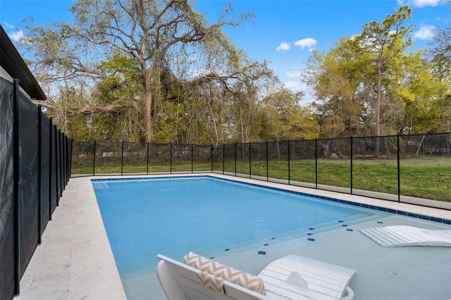 Exterior details and patio area of a home in , Spring Hill (Image 34). Exterior details and patio area of a home in , Spring Hill (Image 34).