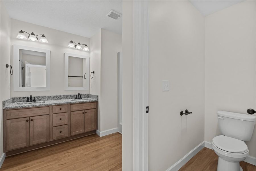 Representative furnished interior of a home built from the Cheshire by Enchanted Homes in Mills Gin, Campobello (Image 6).