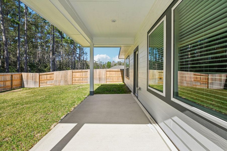 Exterior details and patio area of a home in , New Caney (Image 29).