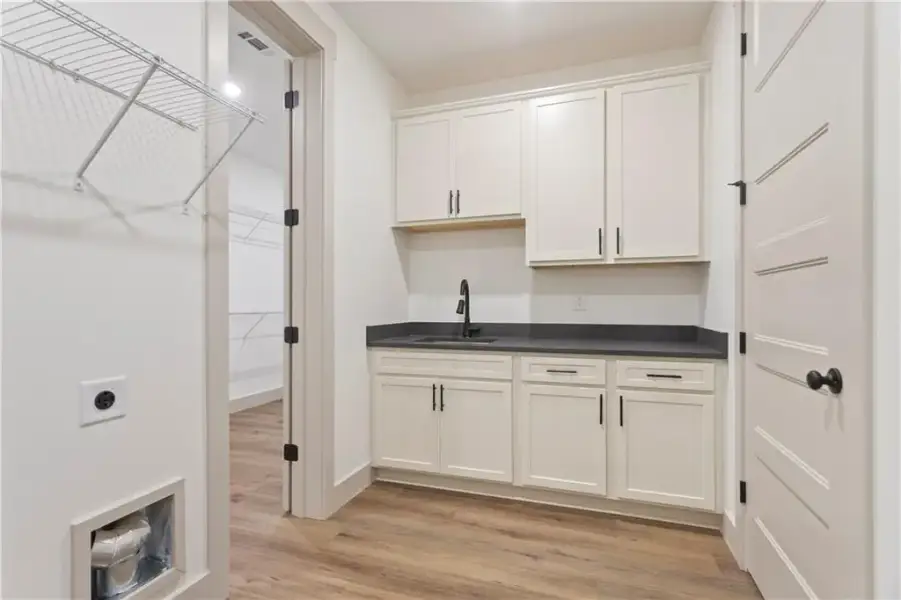 Furnished interior view inside a new home in , Carrollton (Image 6).