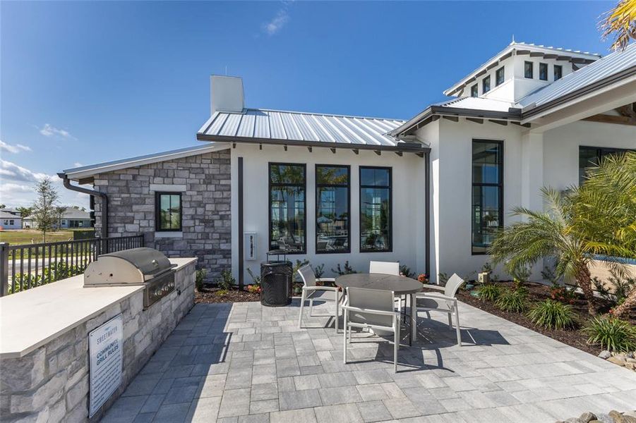 Exterior details and patio area of a home in Sweetwater at Lakewood Ranch, Bradenton (Image 3).