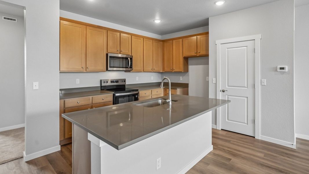 Furnished interior view inside a new home in Windler Townhomes, Aurora (Image 11).