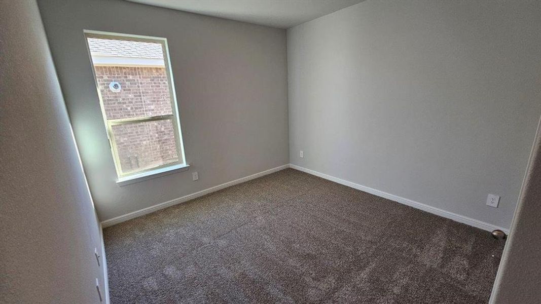 Spacious, unfurnished interior of a new home in Monarch at the Meadows, Ponder (Image 12).