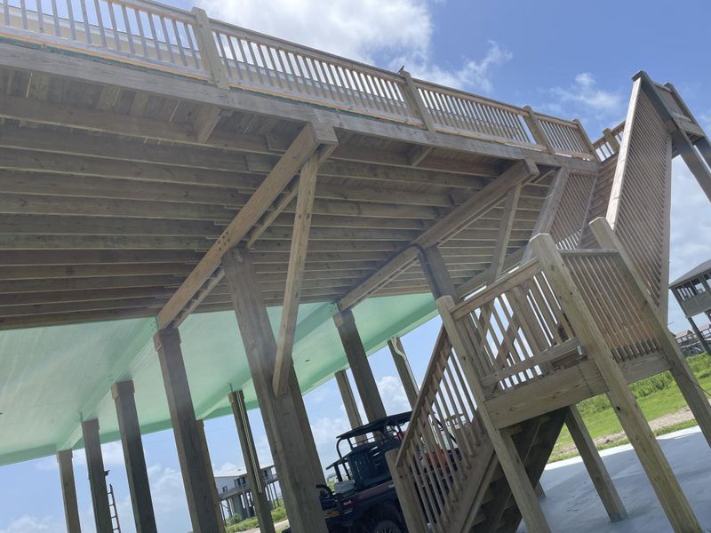 Front exterior of a new home in , Bolivar Peninsula, TX, highlighting curb appeal (Image 20). Front exterior of a new home in , Bolivar Peninsula, TX, highlighting curb appeal (Image 20).