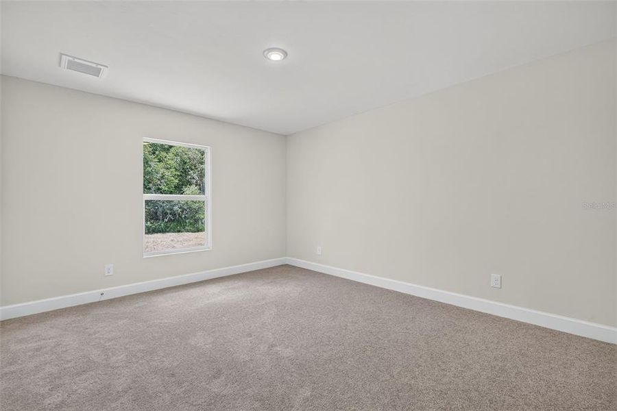 Spacious, unfurnished interior of a new home in , Port Charlotte (Image 13).