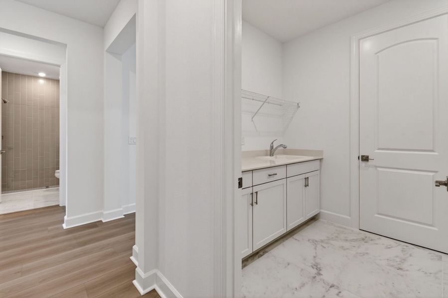 Furnished interior view inside a new home in Del Webb Tradition, Port St. Lucie (Image 17).