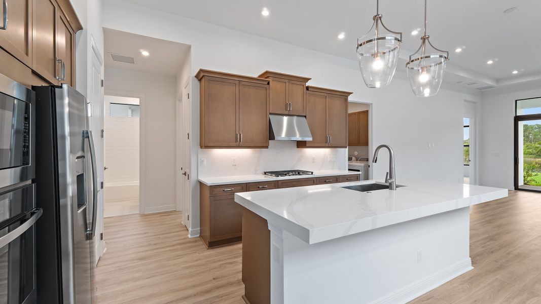 Furnished interior view inside a new home in Rivella, Port St. Lucie (Image 5).