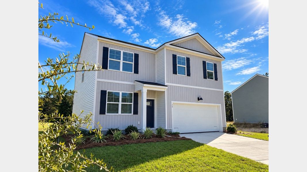 Front exterior of a new home in Cypress Landing, Hardeeville, SC, highlighting curb appeal (Image 23).